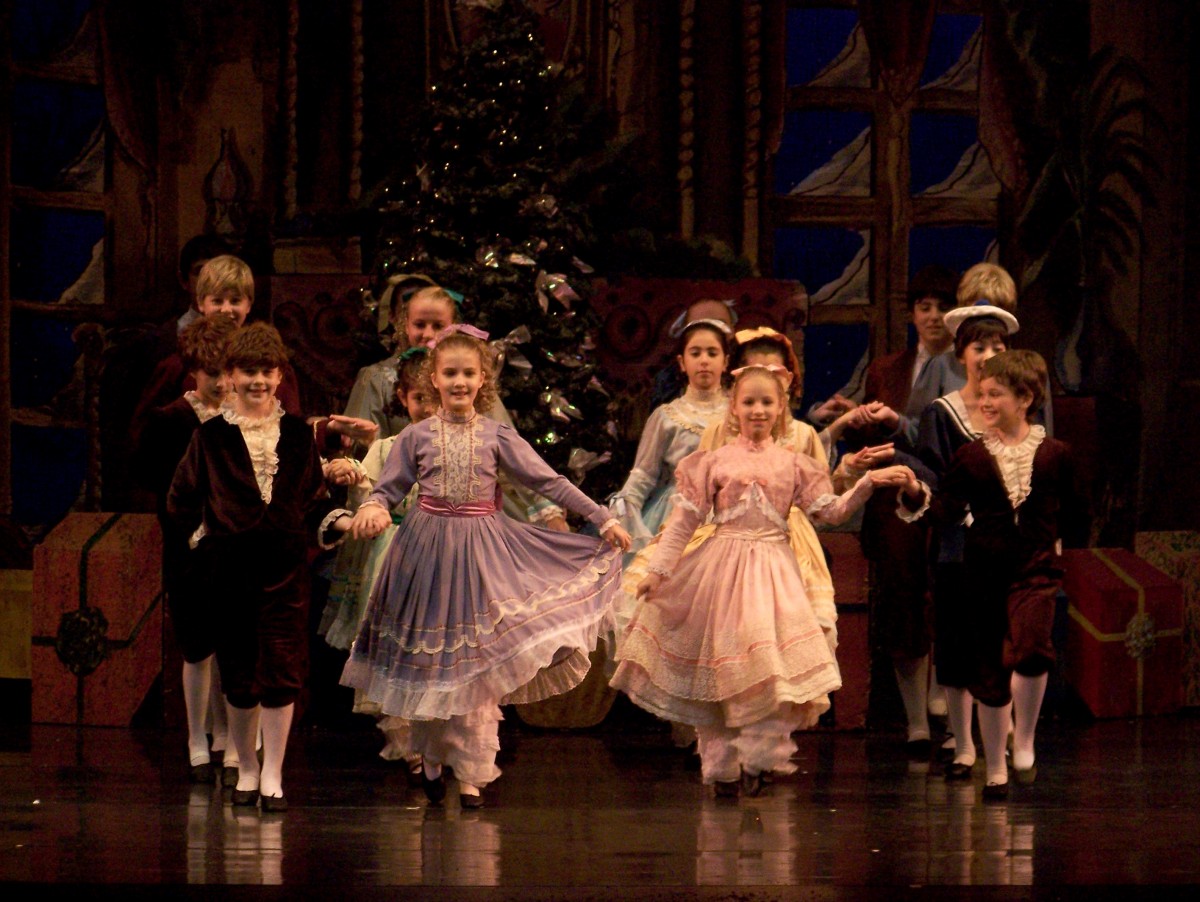 Students performing on stage in The Nutcracker