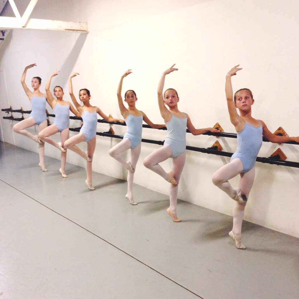 Young dancers at bar